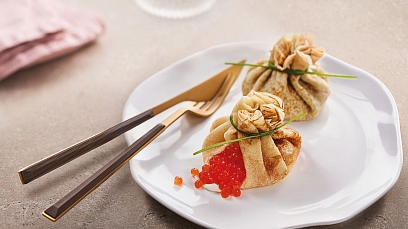 Pancake bags with cheese and caviar filling