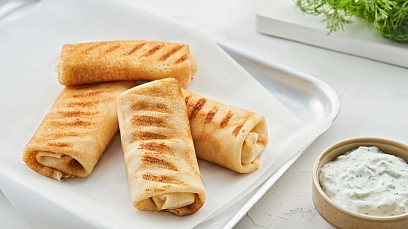 Grilled pancakes with ham and cheese