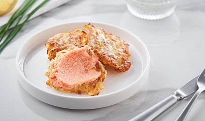 Golden potato pancakes with squash and caviar cream