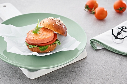 Juicy burger with salmon and tartar sauce